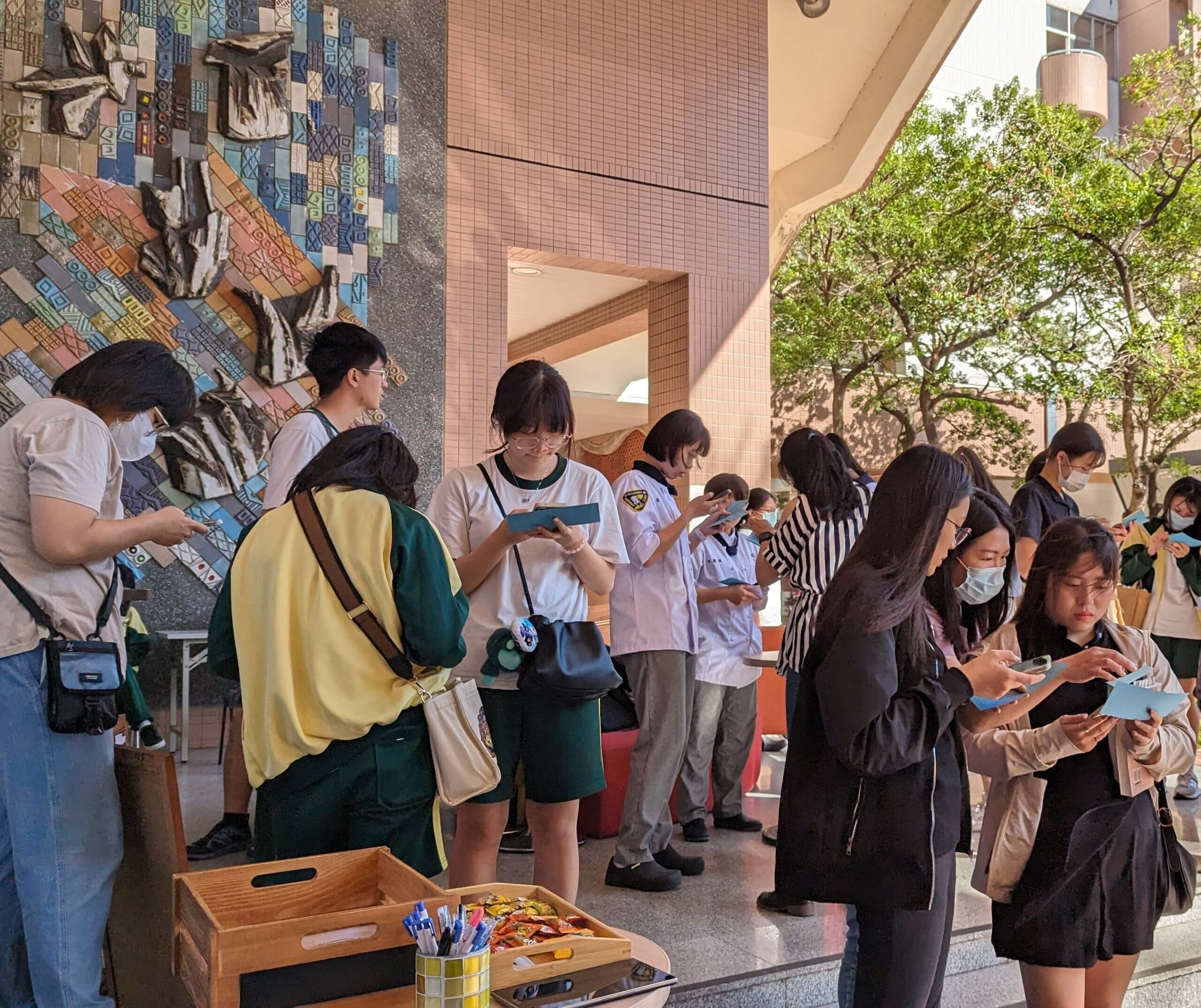 Photo of students standing outside at National Kaohsiung University of Hospitality and Tourism